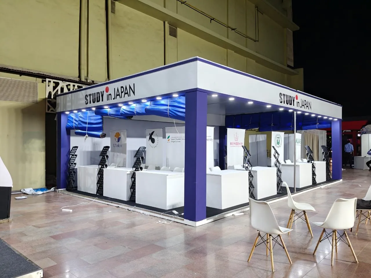 Study in Japan university stand with blue lit canopy