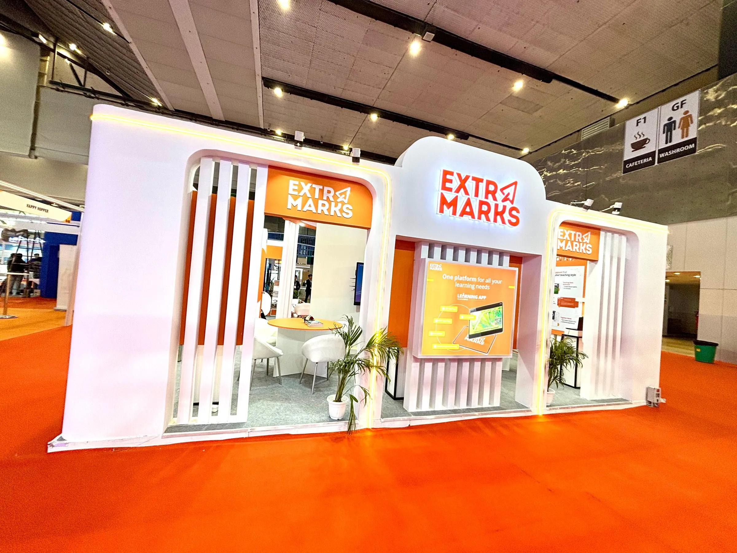 Front view of the Extramarks exhibition booth