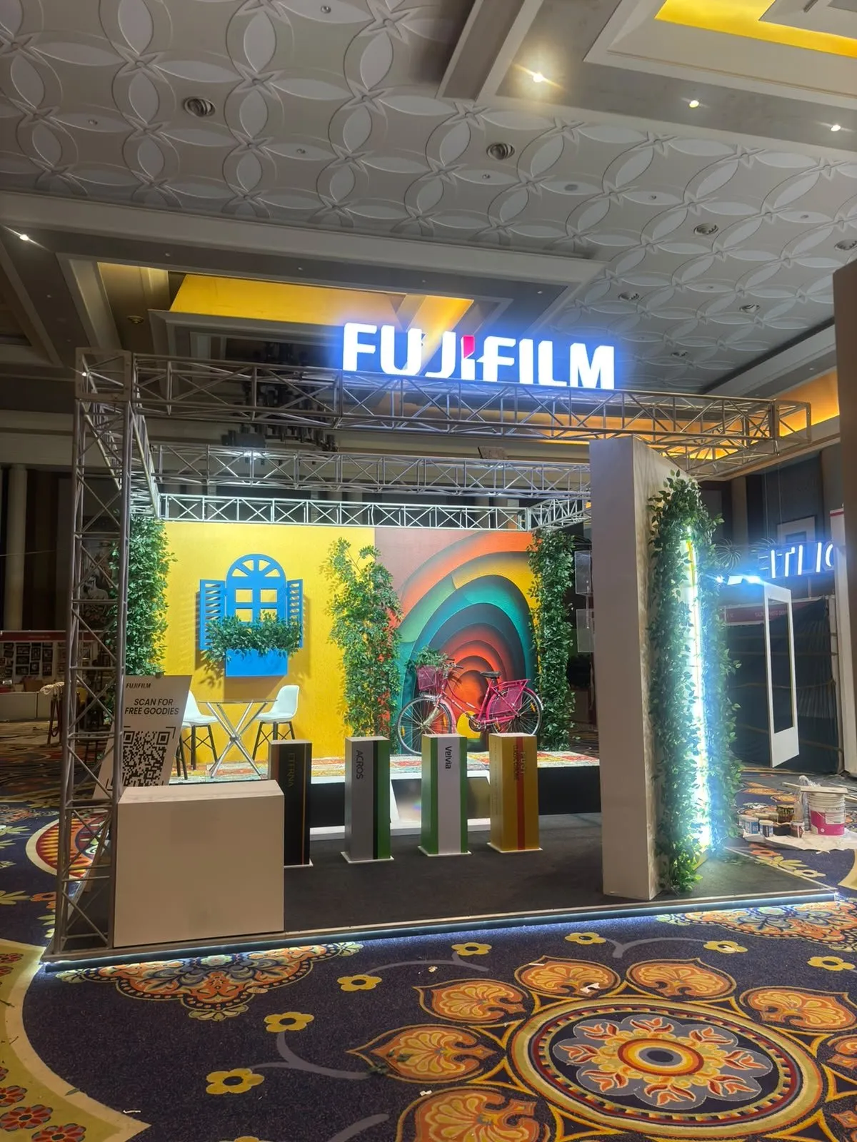 Fujifilm booth with truss frame and lit logo