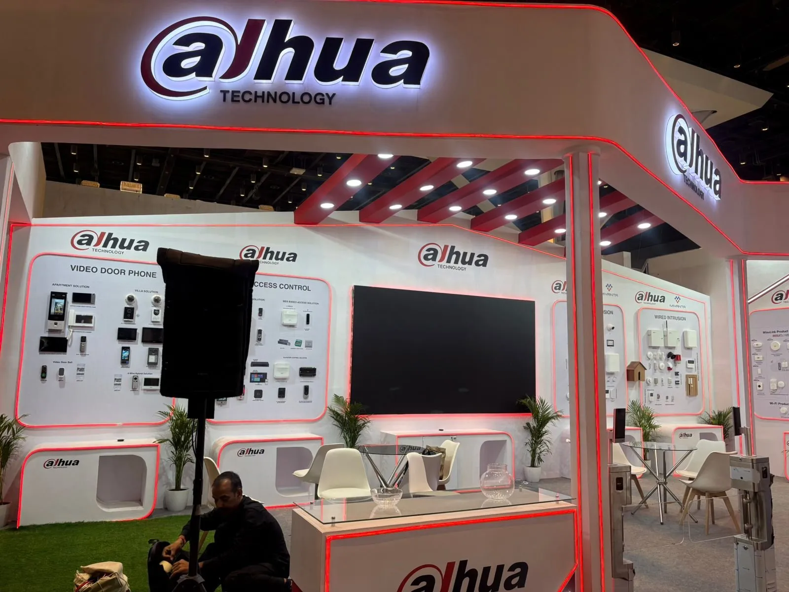 Front of the Dahua smart home booth with a lit logo