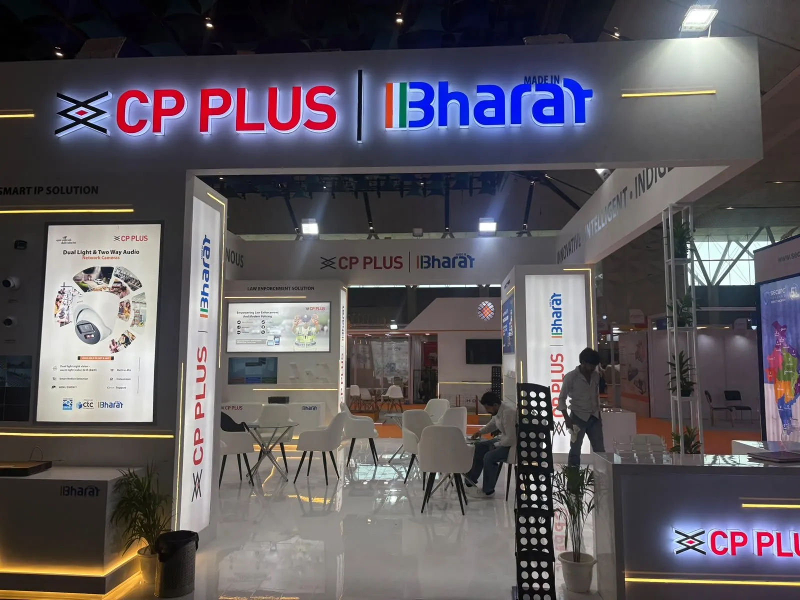 CP Plus booth front with the lit sign and product panels