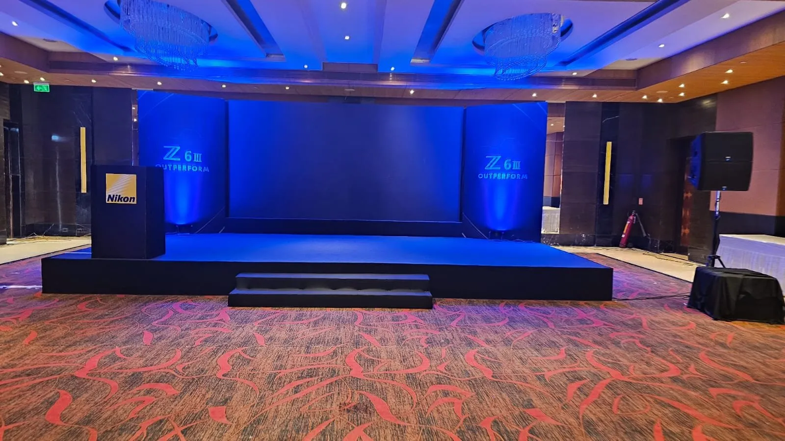 Blue lit main stage with Nikon Z8 branding