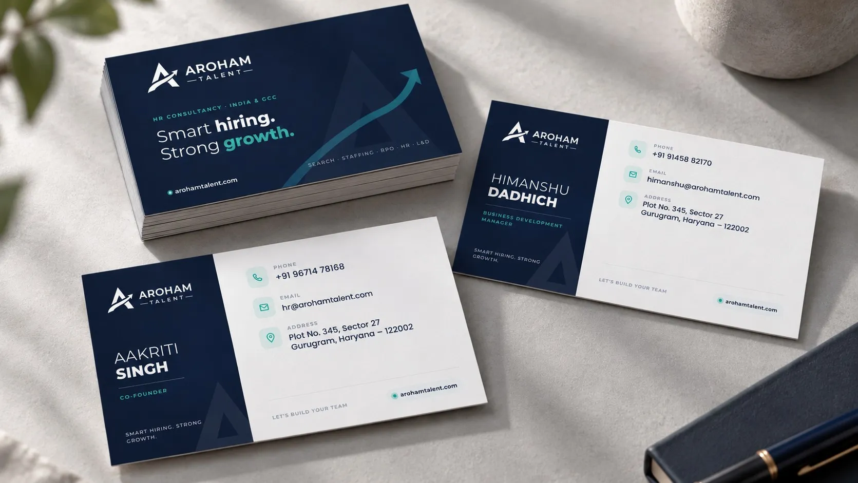 The visiting cards, fronts and back.