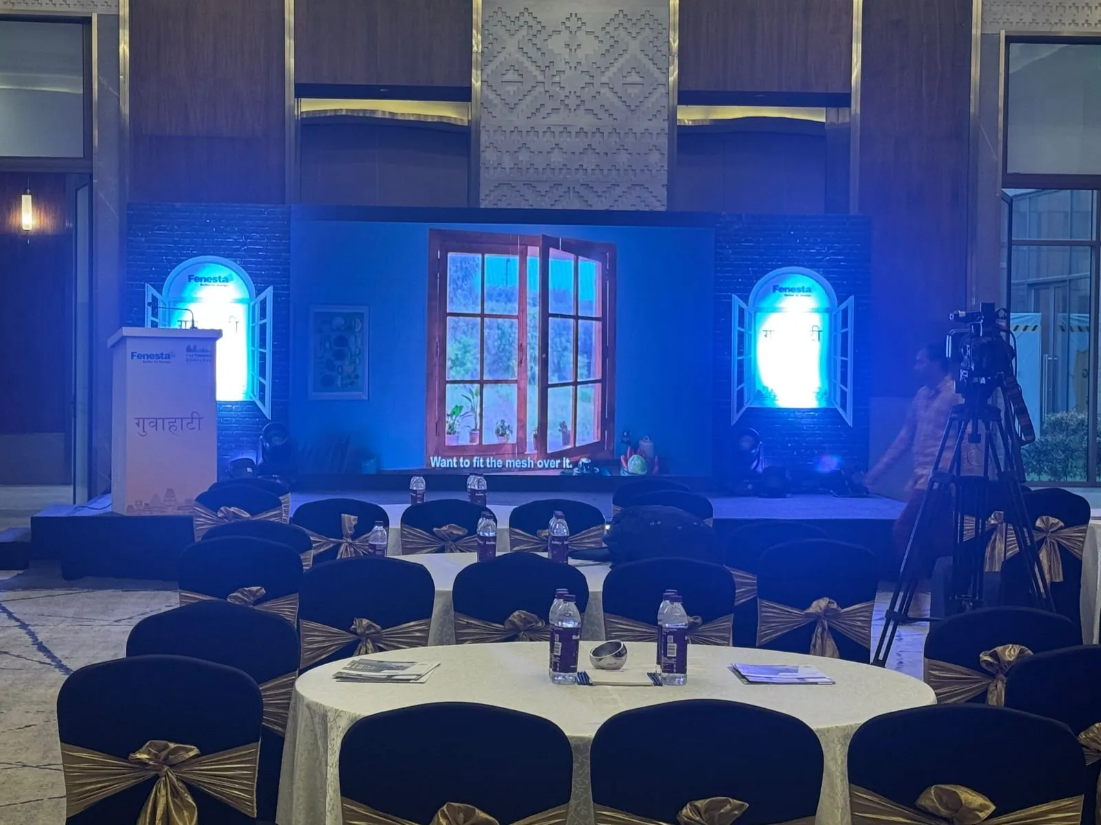 Fenesta Conclave stage with window frames and LED screen